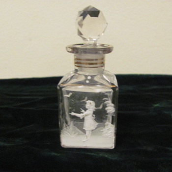 This little bottle sat on my Gran's dresser for over 50 yrs.  Does anyone know what it might be? no marks on it - Art Glass
