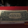 misaligned miscut dollar bill