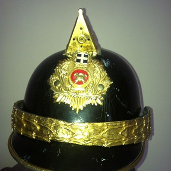 unknown fire helmet, help with any info please