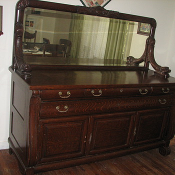 antique oak buffet and server with carved sea creatures