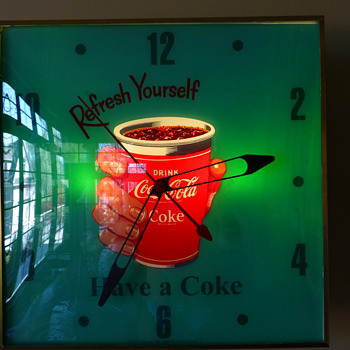 Coca-Cola Cup-in-hand Pam Clock