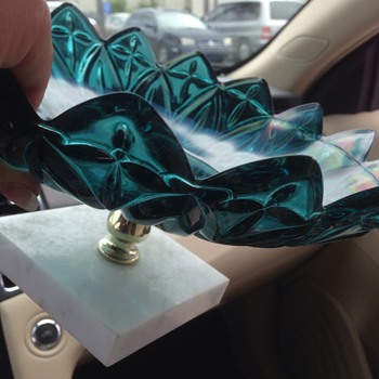 Green pedestal candy dish on a marble base