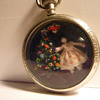 Doll inside Pocket Watch Case
