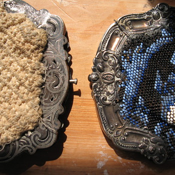 Very old wallets with silver art. 