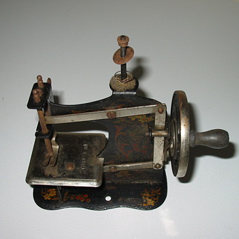 my mother's OLD toy sewing machine