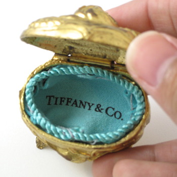 roses and Tiffany and Co. cast metal ring box