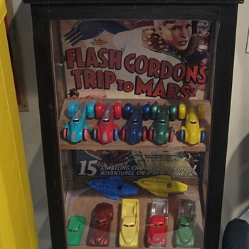 Old display case with old plastic toys - Toys
