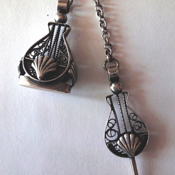 Antique silver filigree watch fob and key on Belcher chain