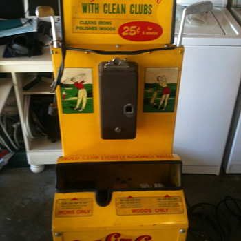 Vintage golf club cleaning machine.