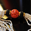Exceptional Early Cartier Carved Coral Bead, onyx and pearls necklace, with 18k solid gold mount