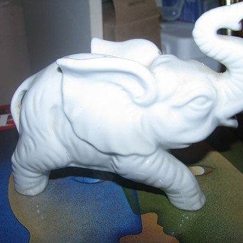 Completely white glass elephant - Animals