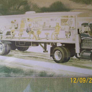 Old photo of Semi with diner painted on side , People look like from 60's 