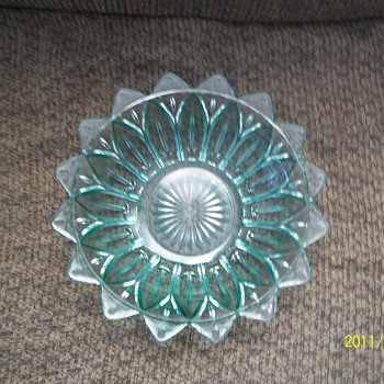 I found this glass bowl in my house that I move into..what are they and what can you tell me of them? Thank you