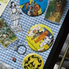 land of oz buttons