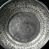 unidentified silver bowl with.8 pointed star and faces