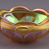 QUEZAL ART GLASS GOLD IRIDESCENT BOWL, circa 1906