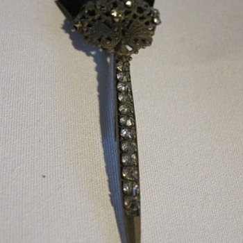 Black and gold colored pin - Costume Jewelry