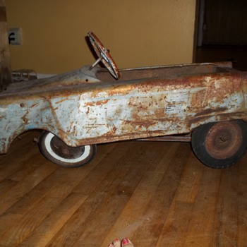 I love my old little pedal car