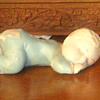 Glazed pottery doll?