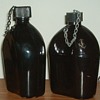 WWII black porcelain enamel coated canteens 1942 era