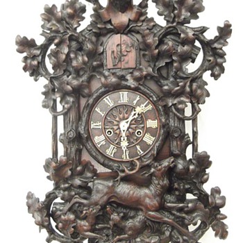 Magnificent carved (spring driven) wall cuckoo clock. WHAT A CARVING! - Clocks