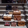 Tooled leather bag collection