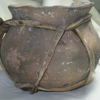 Native?  What is this, and what is the purpose of the rawhide? - Native American