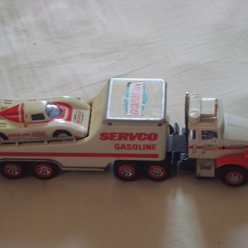 1989 servco gasoline toy truck with racing car ( original hess tire) - Model Cars
