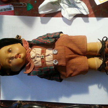 Hummel Doll ? This is a large hand painted doll that appears to be paper mache. Any Ideas, Comments Welcome