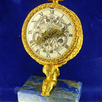 A Rare Omega movement clock by EF Caldwell - Clocks