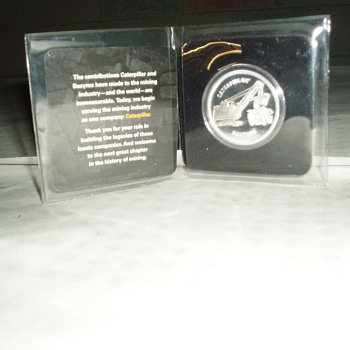 Bucyrus - Caterpillar merger commemorative coin [possible one ounce silver] - Advertising