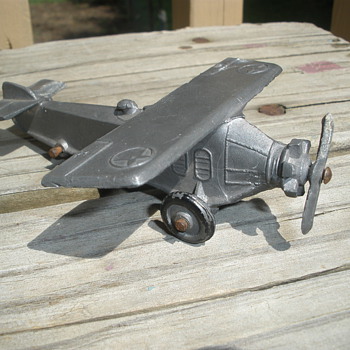 Kansas Toy & Novelty Co Army Air Corps Plane, anodized finsh with cast prop. - Toys