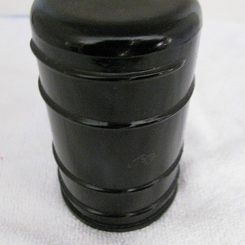 ANTIQUE BLACK THREADLESS GLASS INSULATOR "WADE STYLE"