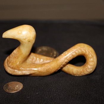 Ancient or Old antique Snake carved.
