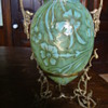 Vaseline Opalescent vase in brass stand