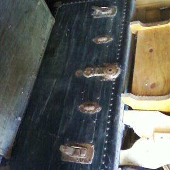 Vintage trunk, claw foot tub.