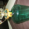 antique green lock and key liquor bottle