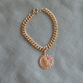 Unusual solid gold bracelet and charm (medal?) - Fine Jewelry