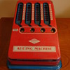 C.1940S - EARLY 1950 WOLVERINE ADDING MACHINE TIN TOY- USA