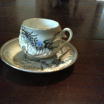 Japanes Tea cup and saucer with hidden Geisha girl in cup