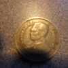need help with this coin looks weird anyone knows if has value