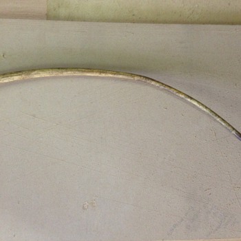 Ivory cane? Boars tooth handle.
