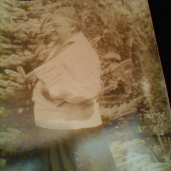 What book is she holding?