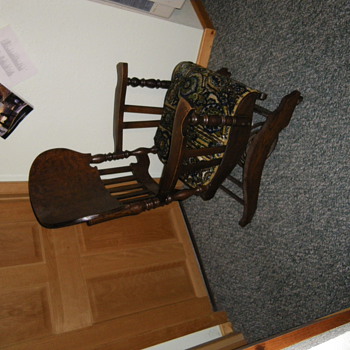 This was my great grandmas chair I believe the tag says chair number 24 anyone know anything about this chair??