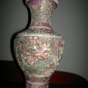 Asian Bronze vase with carvings 