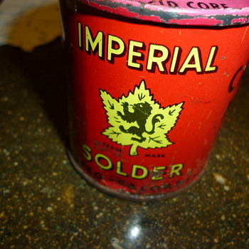 A roll of solder with the original case or covering with a nice logo