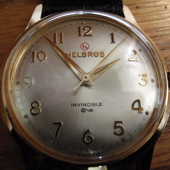 1960 Helbros 17 Jewel embossed logo watch