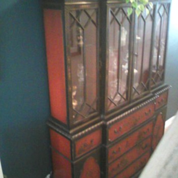 Breakfront, hand painted oriental. Also has a pull out secretaryal desk.