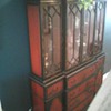 Breakfront, hand painted oriental. Also has a pull out secretaryal desk.