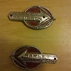 Early Harley Davidson tank badges.